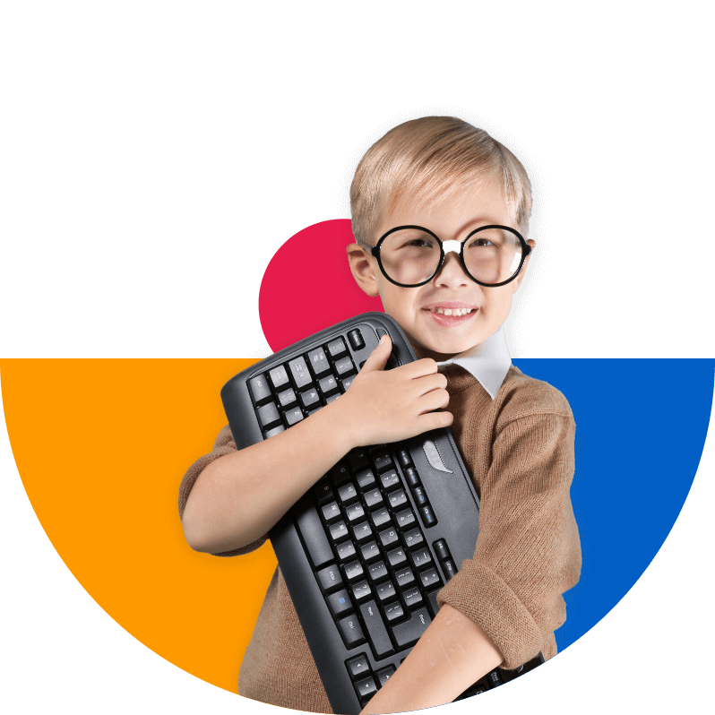 little boy holding keyboard