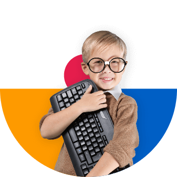 little boy holding keyboard